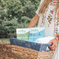 Woman holding Earth Breeze Laundry Detergent Sheets